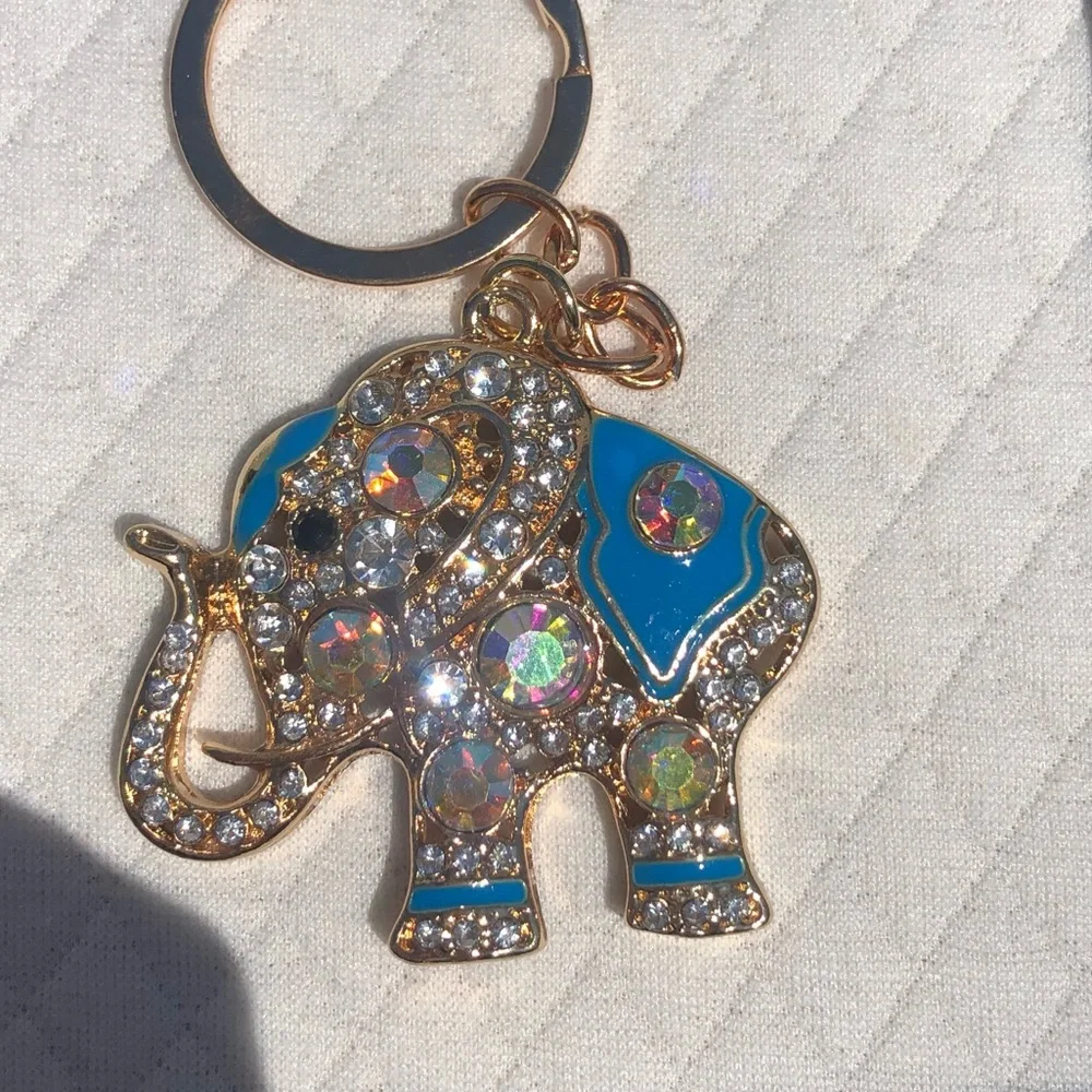 Beautiful lightweight sparkly elephant keychain 💙🐘🤍 - Picture 4 of 7